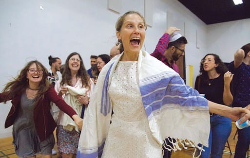 Rabbi Susan Goldberg dancing with the community
